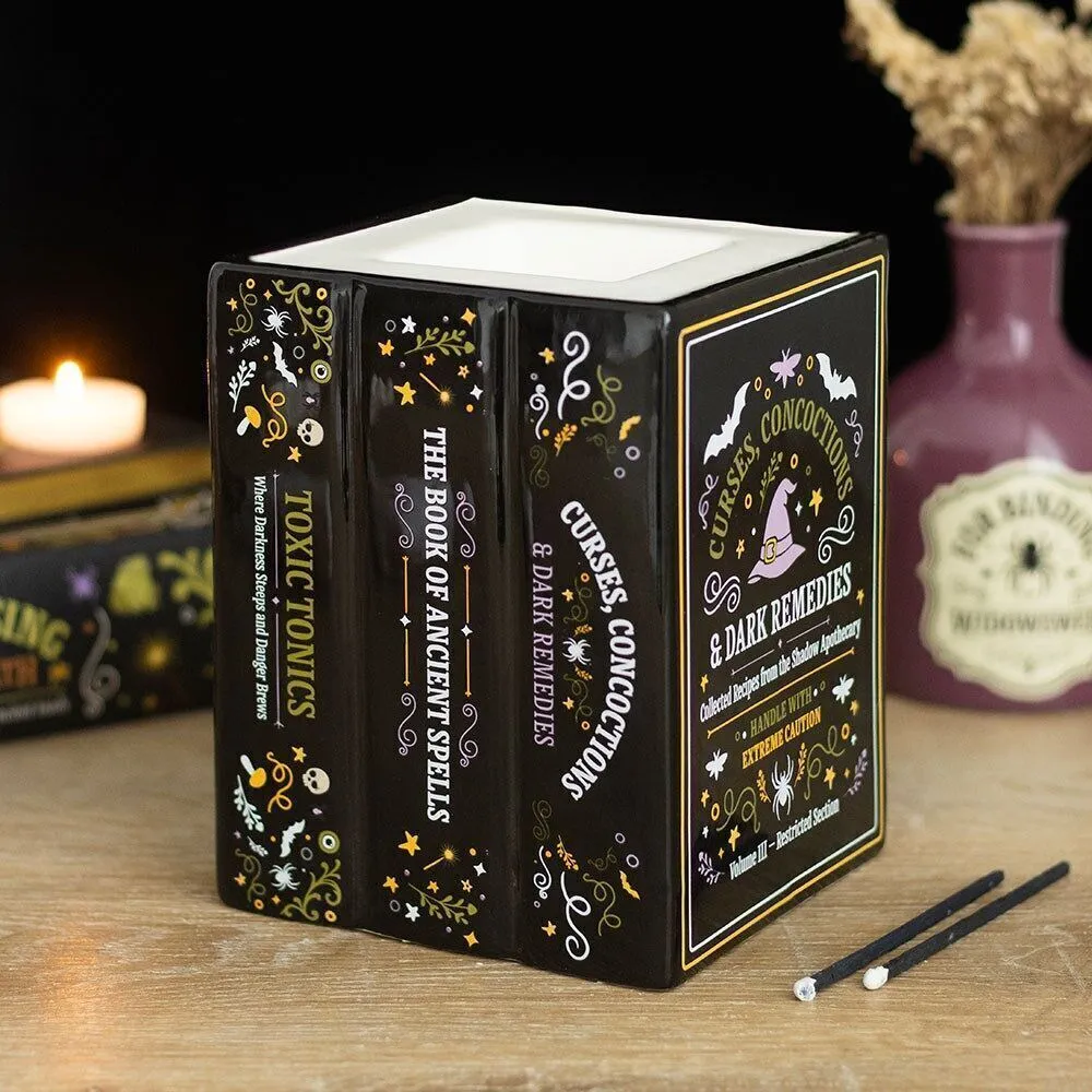 Brûleur d'huile et chauffe-cire en forme de livre d'apothicaire de sorcière