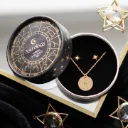 Parure boucles d'oreilles et collier roue d'astrologie