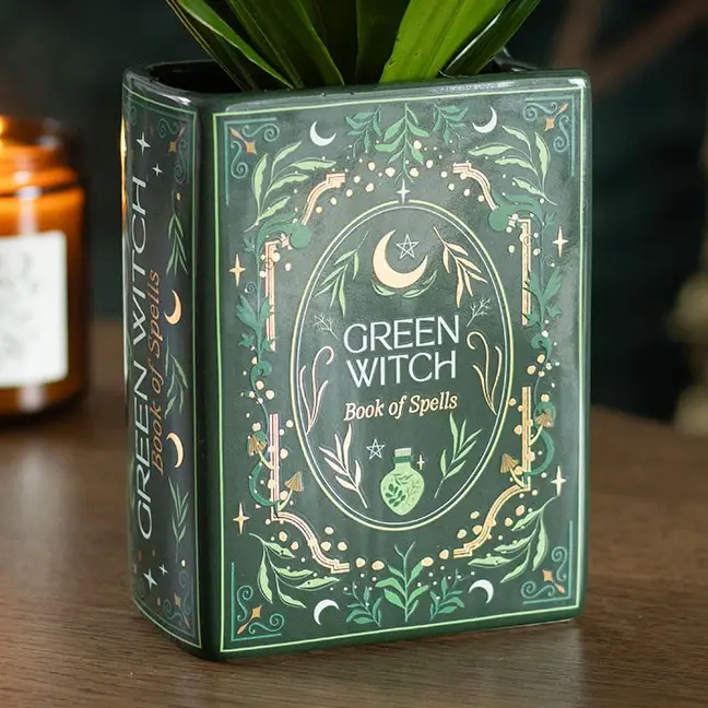 Vase en forme de livre de sorcière verte